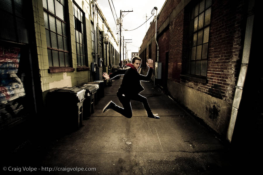 cav081009_8200 jumping in an alleyway